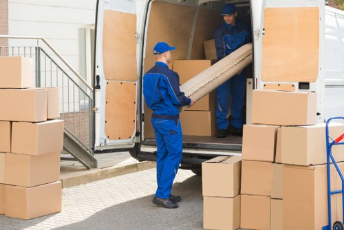 Removal Van Queenspark team preparing items safely with protective equipment
