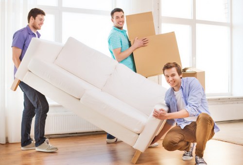Securely packed boxes prepared for a Queens Park removal van