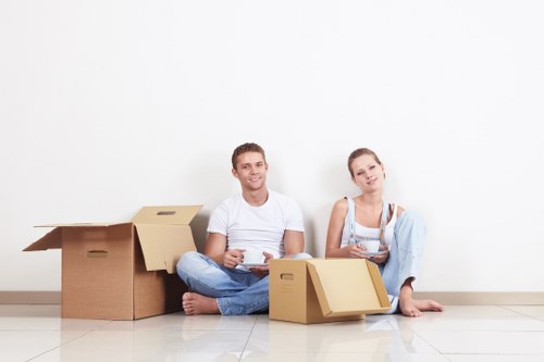 Staff member handling a removal van complaint with careful communication