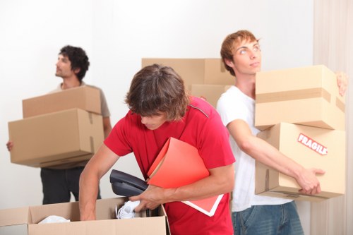 Moving boxes and furniture prepared for house removals in Queenspark