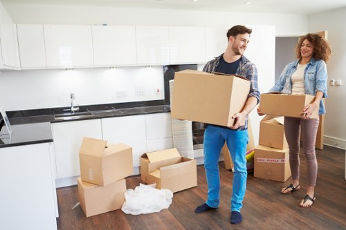 Staff completing a risk assessment before a house move