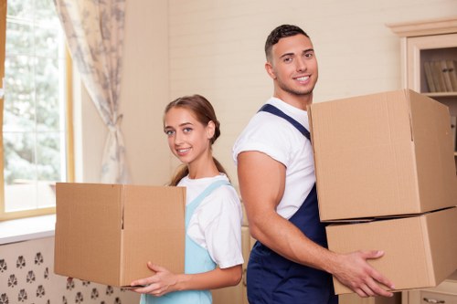 Professional moving truck service loading furniture in Queenspark