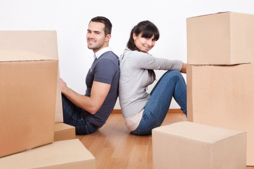 Organized moving boxes and packing materials used for Queenspark relocation services