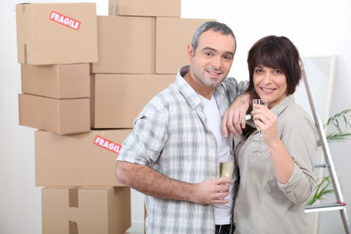 Queenspark moving truck handling residential boxes and appliances